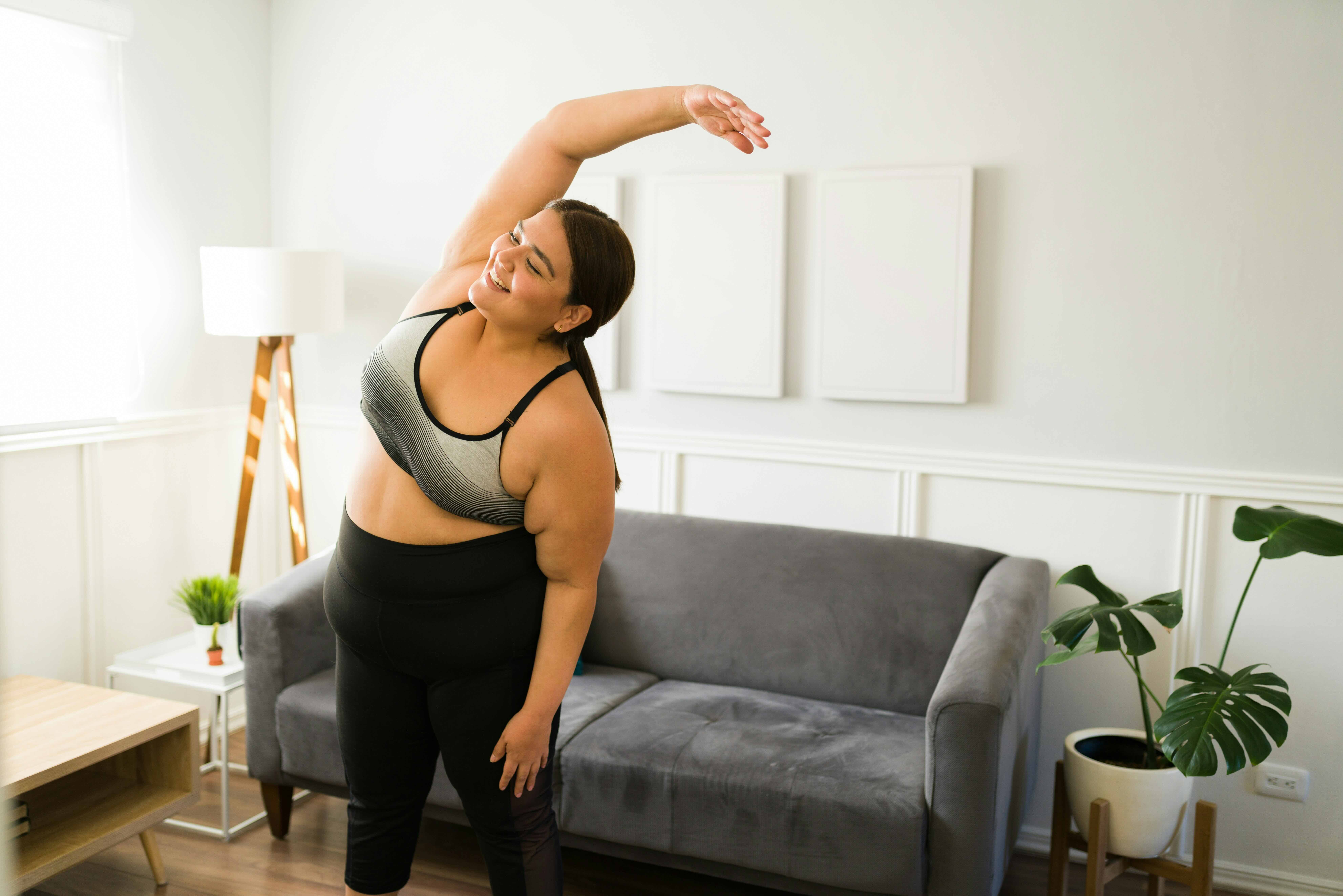 Woman with PMOS stretching